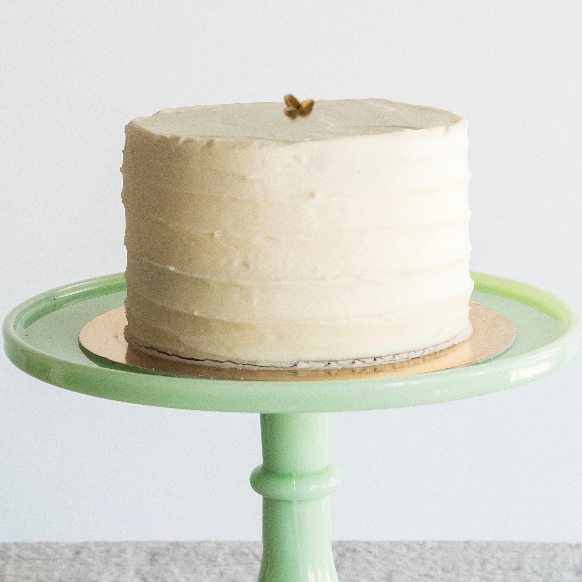 Pistachio cardamom cake + honey buttercream (gluten-free ingredients)