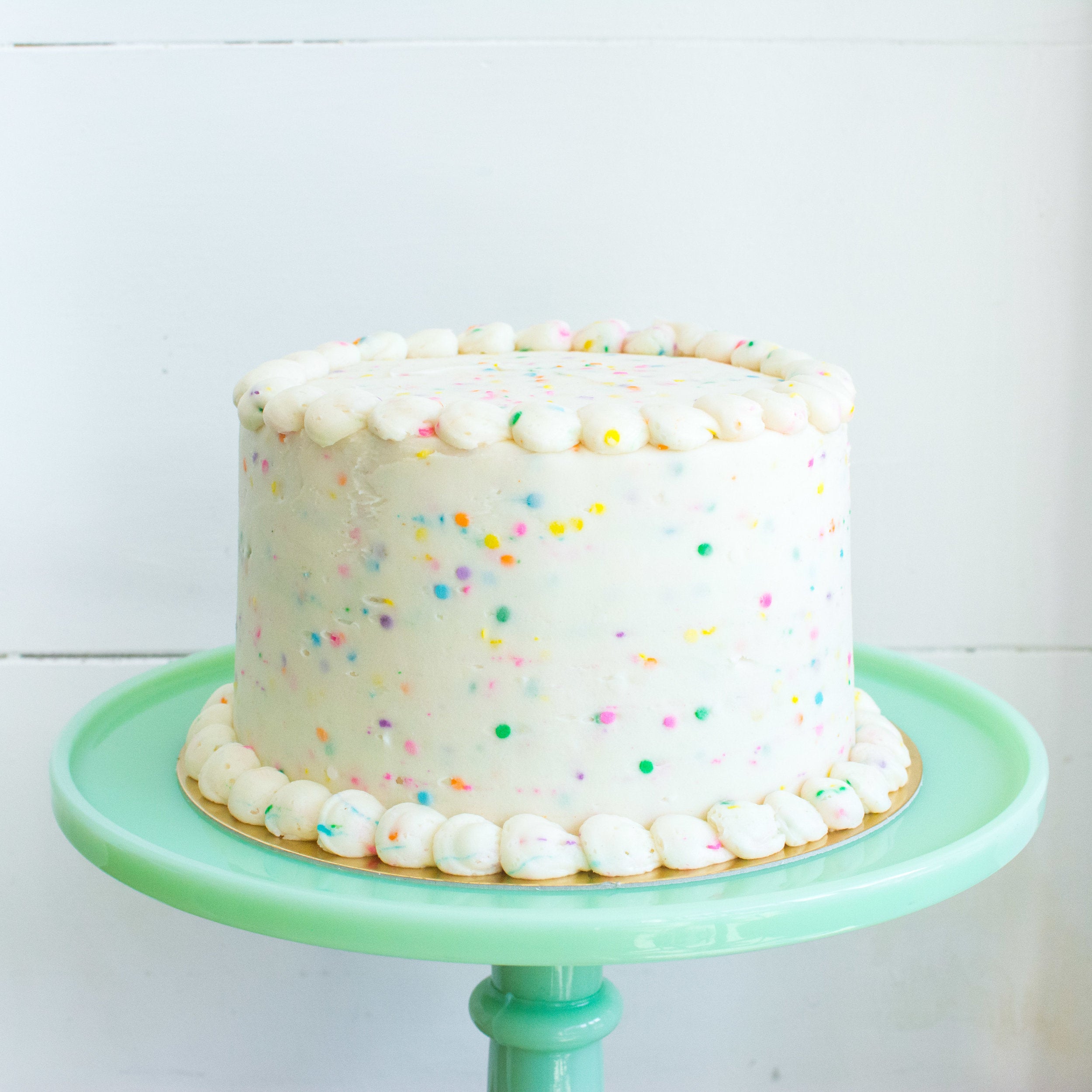Vanilla Celebration Cake with Vanilla Buttercream and Rainbow Sprinkles